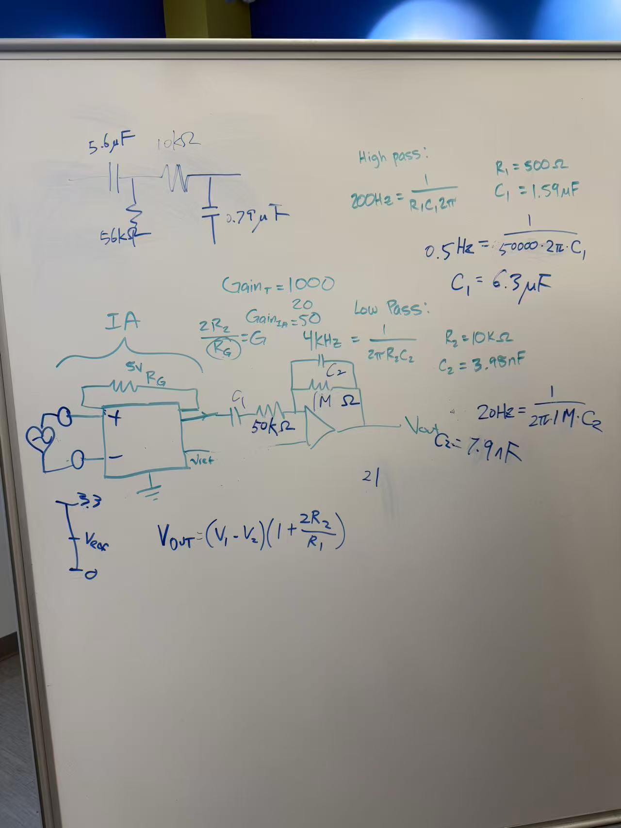 Whiteboard calculations and circuit sketches for the ECG amplifier and high-pass and low-pass filters